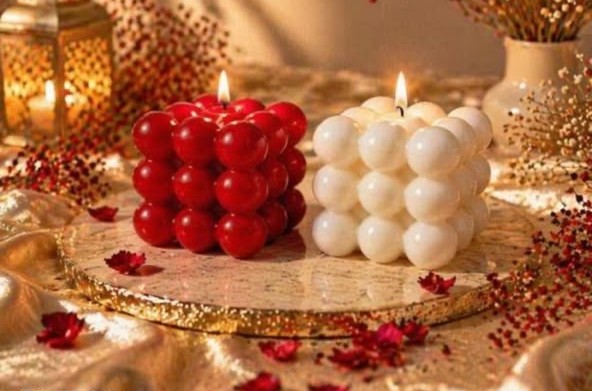 Red and white bubble candles with no flower on top