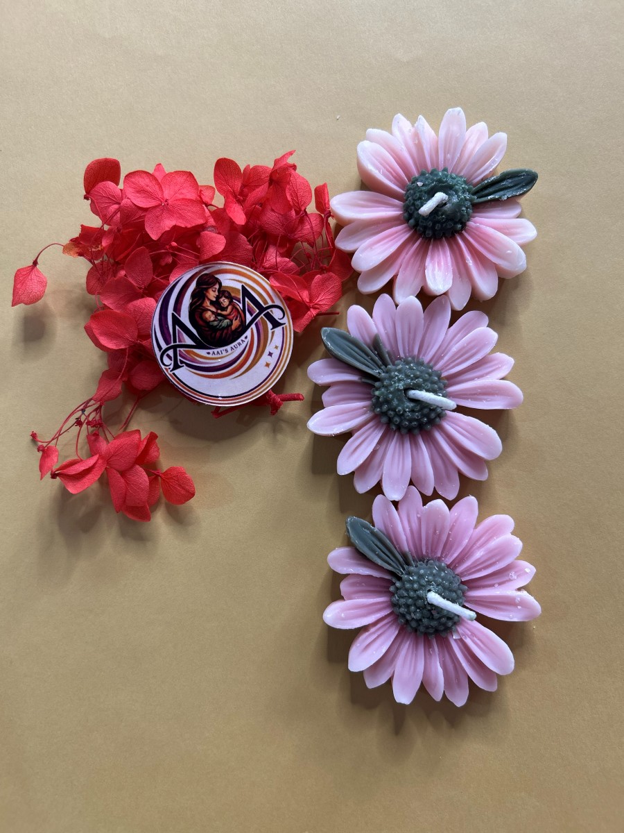 Daisy candles photographed as a small group. Sold individually.