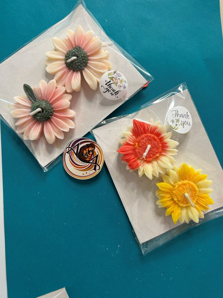 Two sunflower candles photographed together. Sold individually.