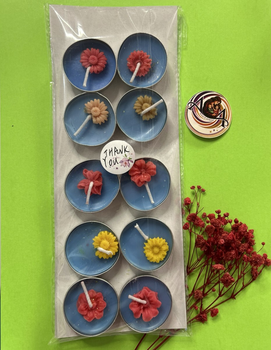 Pack of ten blue decorative tea lights with wax flowers