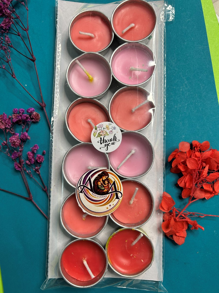 Pack of twelve simple tea lights in pink and red