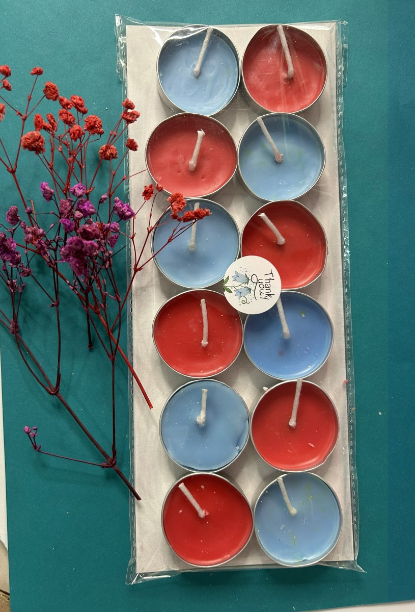 Pack of twelve simple tea lights in red and blue