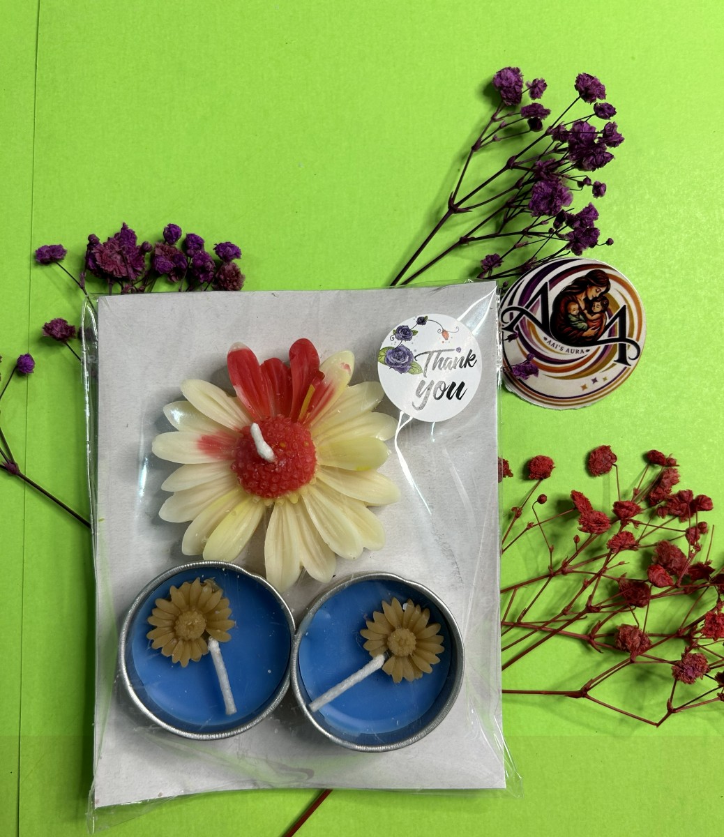 Tea light and daisy combo with the brand sticker